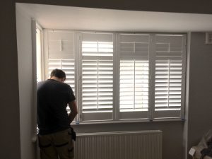 Full-height-shutters-fitted-to-bay-window-in-Romford-Essex-1